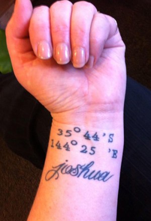 tattoo of co-ordinates and name Johsua
